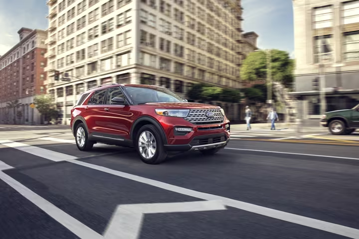 Taking a Ford test drive in a red SUV