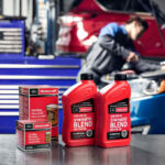 Mechanic performing a Ford oil change