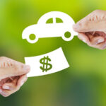 Hands exchanging 2D car and dollar, representing Ford financing