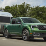 2026 Ford Maverick Hybrid towing a camper