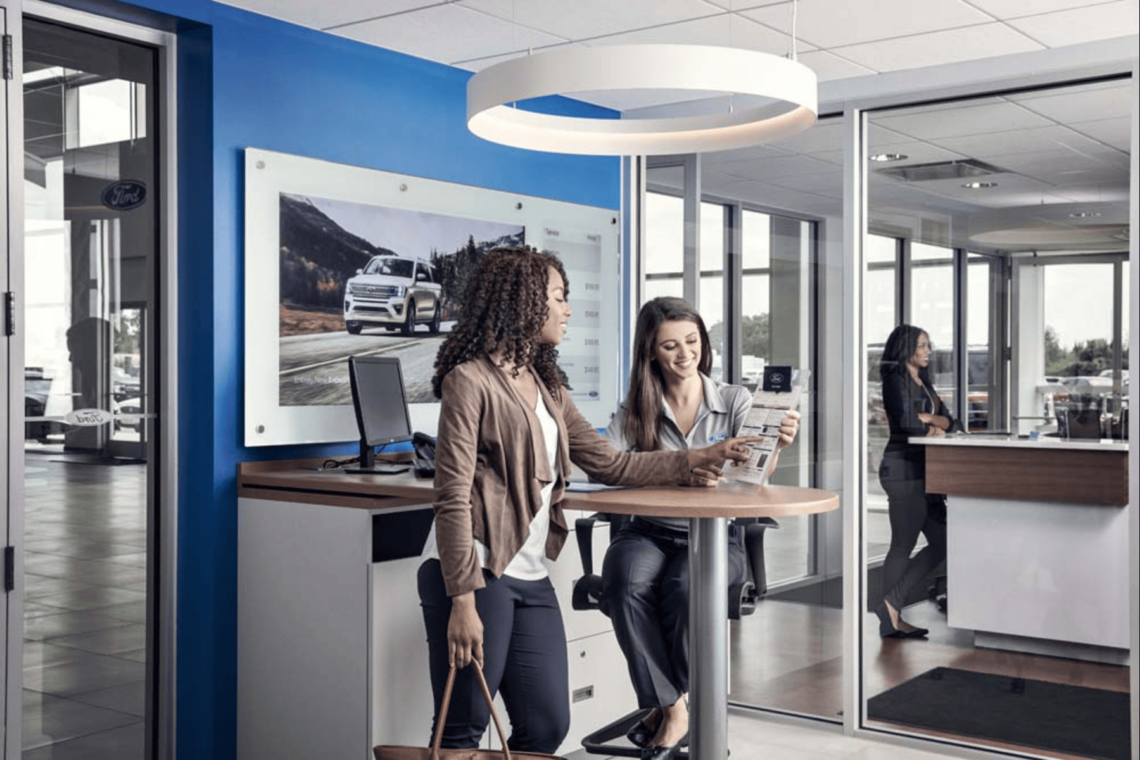 Ford team member helping a customer