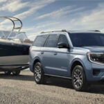 2026 Ford Expedition towing a boat