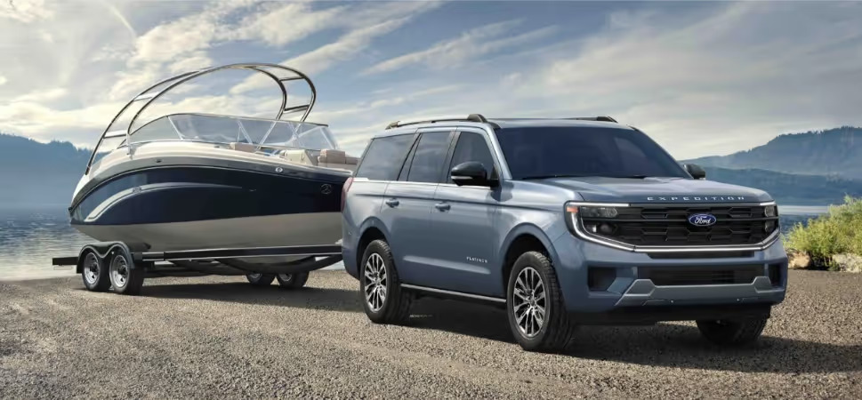 2026 Ford Expedition towing a boat